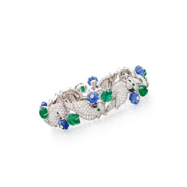 View full screen - View 1 of Lot 215. 'Les Oiseaux Libérés' Diamond, Emerald, Sapphire and Mother-of-Pearl Bracelet | 卡地亞 | 'Les Oiseaux Libérés' 鑽石,祖母綠 及 藍寶石 配 貝母 手鏈.