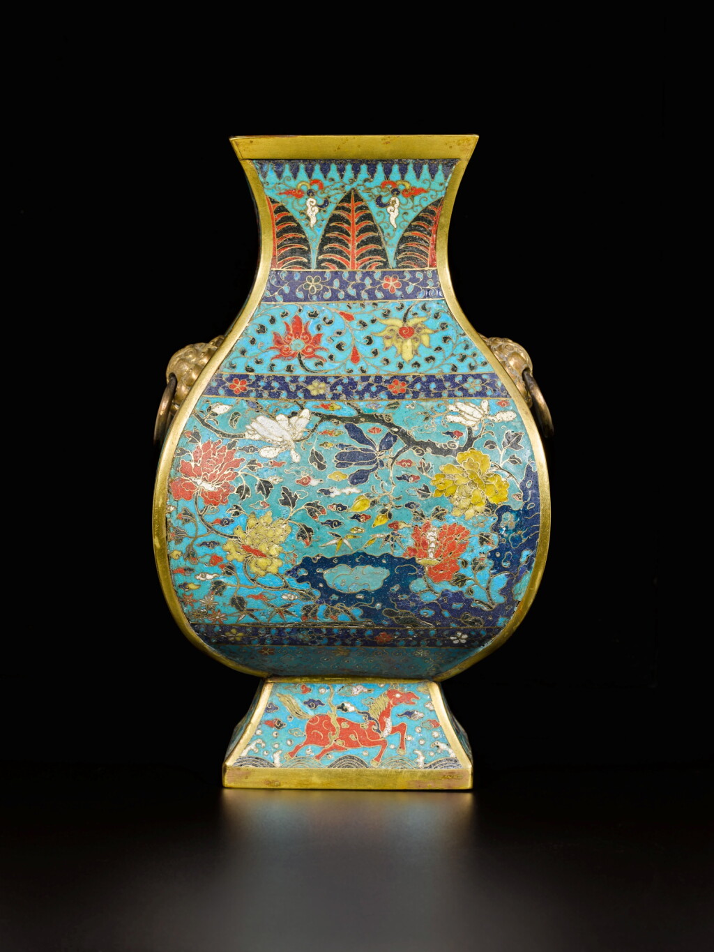 View full screen - View 1 of Lot 105. A cloisonné enamel 'floral' square vase (Fanghu), Qing dynasty, Kangxi period | 清康熙 掐絲琺瑯花卉紋方壺.
