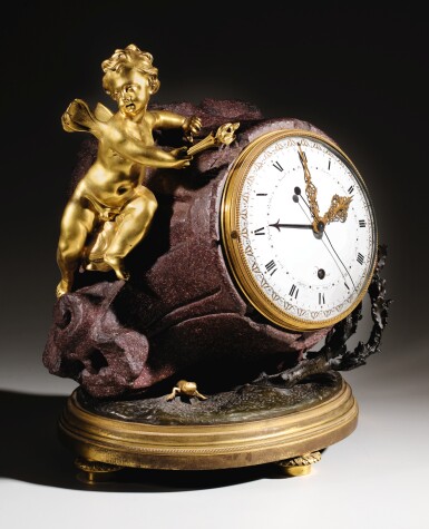 View full screen - View 1 of Lot 69. A ROMAN CARVED PORPHYRY CAPITAL MOUNTED AS A TIMEPIECE THE CAPITAL, CIRCA III-IV CENTURY A.D | THE CLOCK TIMEPIECE AND MOUNTS, LOUIS XVI, CIRCA 1780, THE MOVEMENT BY JACQUES FRANÇOIS VAILLANT, THE ENAMEL DIAL BY DUBUISSON .