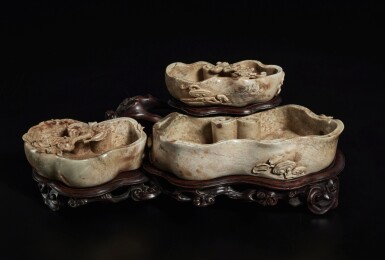 View full screen - View 1 of Lot 172. A set of three chicken-bone jade 'lingzhi' washers, 17th / 18th century.