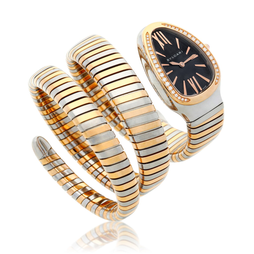 View full screen - View 1 of Lot 168. Reference SP 35 SPG Serpenti, A stainless steel, yellow gold and diamond-set cuff watch, Circa 2015.