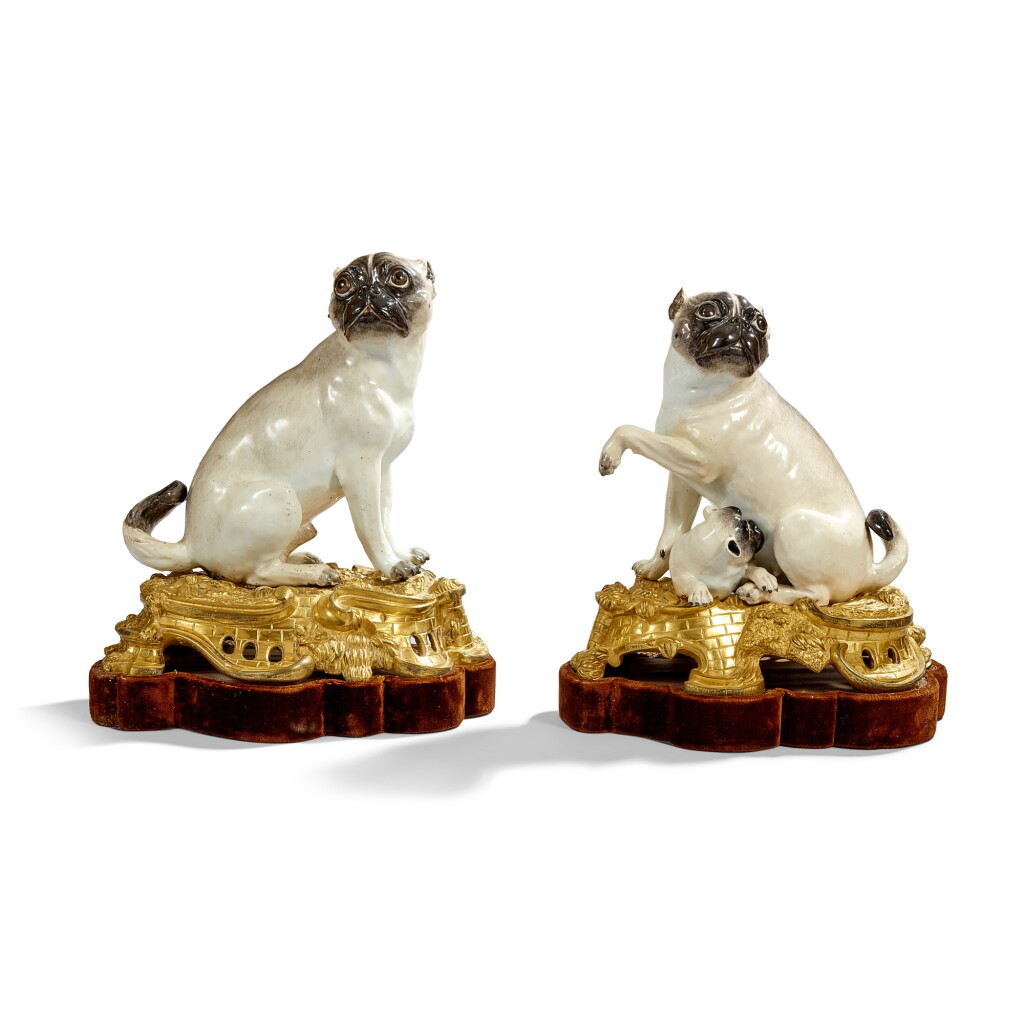 View full screen - View 1 of Lot 33. A pair of Meissen porcelain pug dogs, the porcelain circa 1750, with Louis XV-style gilt-bronze mounts.