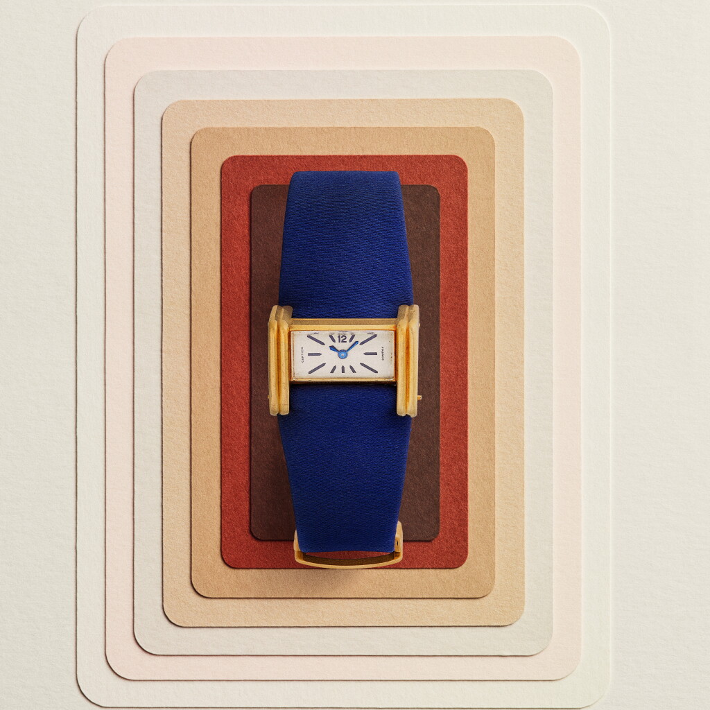 View full screen - View 1 of Lot 19. Driver | A very rare yellow gold triangular prism-form driver’s rear-wound wristwatch with gold deployant buckle | Circa 1945-46.
