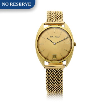View full screen - View 1 of Lot 89. A YELLOW GOLD WRISTWATCH WITH DATE AND BRACELET, CIRCA 1960.