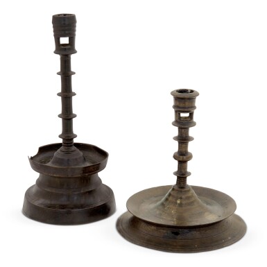 View full screen - View 1 of Lot 8. Two Very Rare Northwestern European Cast Brass Circular-Based Candlesticks, 15th and Early 16th Century.