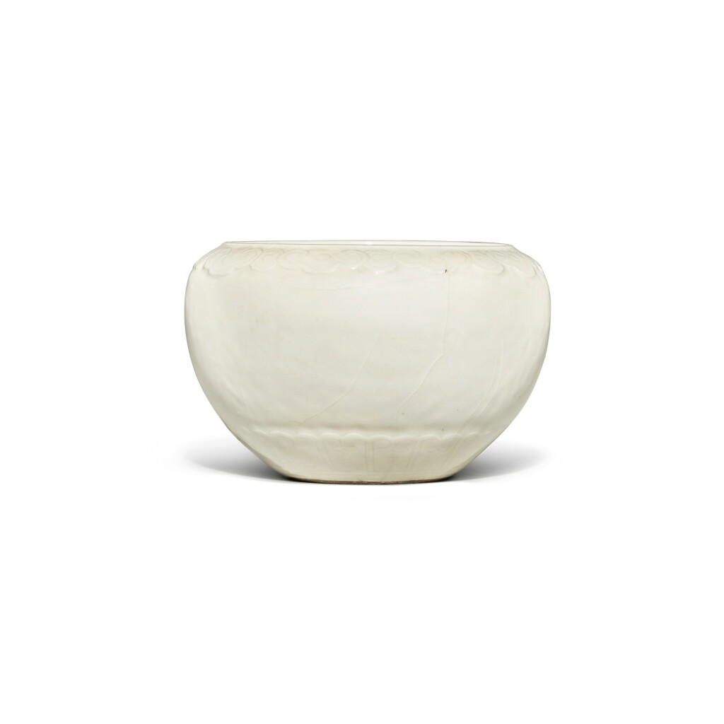 View full screen - View 1 of Lot 5. A molded and incised soft-paste waterpot, Qing dynasty, 19th century.