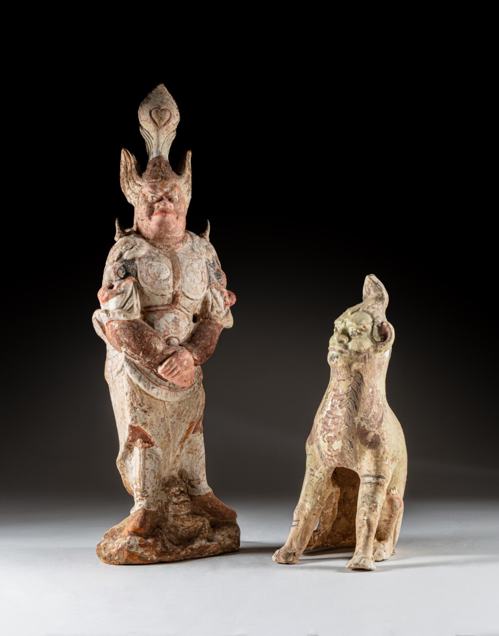 View full screen - View 1 of Lot 301. Two pottery figures of tomb guardians, Tang dynasty.