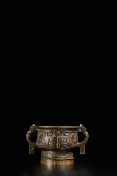 View full screen - View 1 of Lot 221. An archaistic bronze 'taotie' gui-form incense burner, 17th / 18th century century .