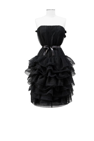 View full screen - View 1 of Lot 84. Irene Galitzine, Haute Couture 1960, Fishnet bustier dress with ruffled skirt | Robe courte bustier en résille, jupe à volants superposés.