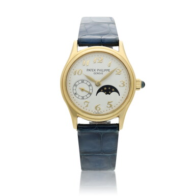 View full screen - View 1 of Lot 25. Reference 4856 A yellow gold wristwatch with moon phases, Circa 1999 .