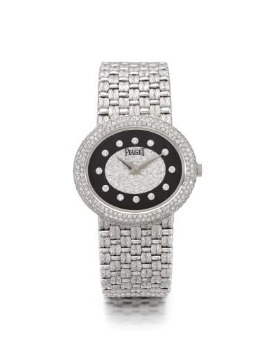 View full screen - View 1 of Lot 54. PIAGET | REF 98125 D 23, A WHITE GOLD AND DIAMOND SET BRACELET WATCH CIRCA 1990.