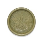 A carved 'Yaozhou' celadon-glazed 'peony' dish, Northern Song dynasty