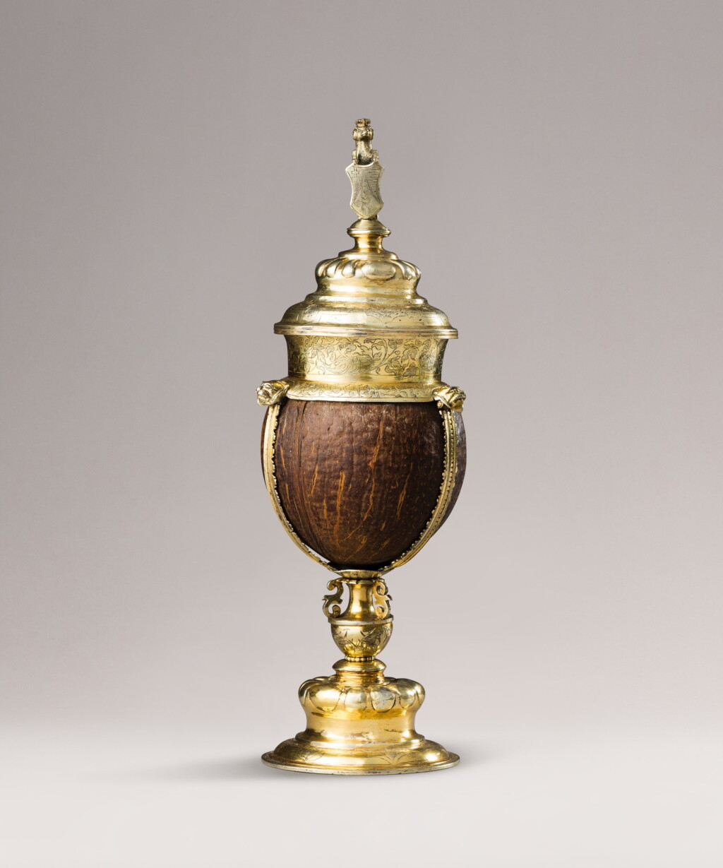 View full screen - View 1 of Lot 329. A coconut covered cup with gilt metal mounts, illegible marks, probably Germany, circa 1600 | Coupe couverte en noix de coco montée métal doré, poinçons illisibles, probablement Allemagne, vers 1600.