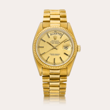 View full screen - View 1 of Lot 2107. Day-Date, Reference 1803 | A yellow gold wristwatch with Portuguese day, date and bracelet, Circa 1975.