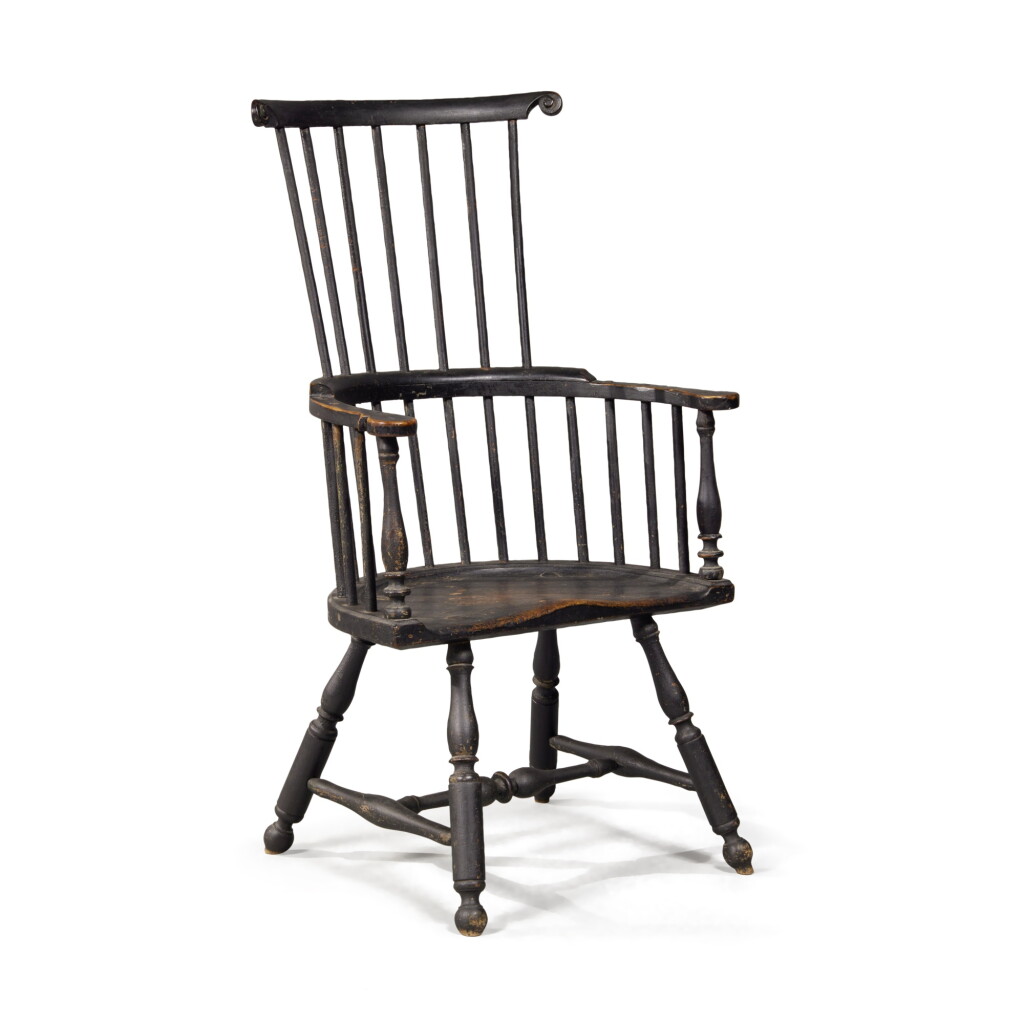 View full screen - View 1 of Lot 166. Very Rare Black-Painted Scroll-Carved Comb-Back Windsor Armchair, Probably Lancaster County, Pennsylvania, circa 1760.