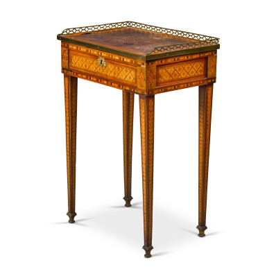 View full screen - View 1 of Lot 54. A Louis XVI gilt-bronze mounted tulipwood, satinwood and fruitwood table à écrire, circa 1780.