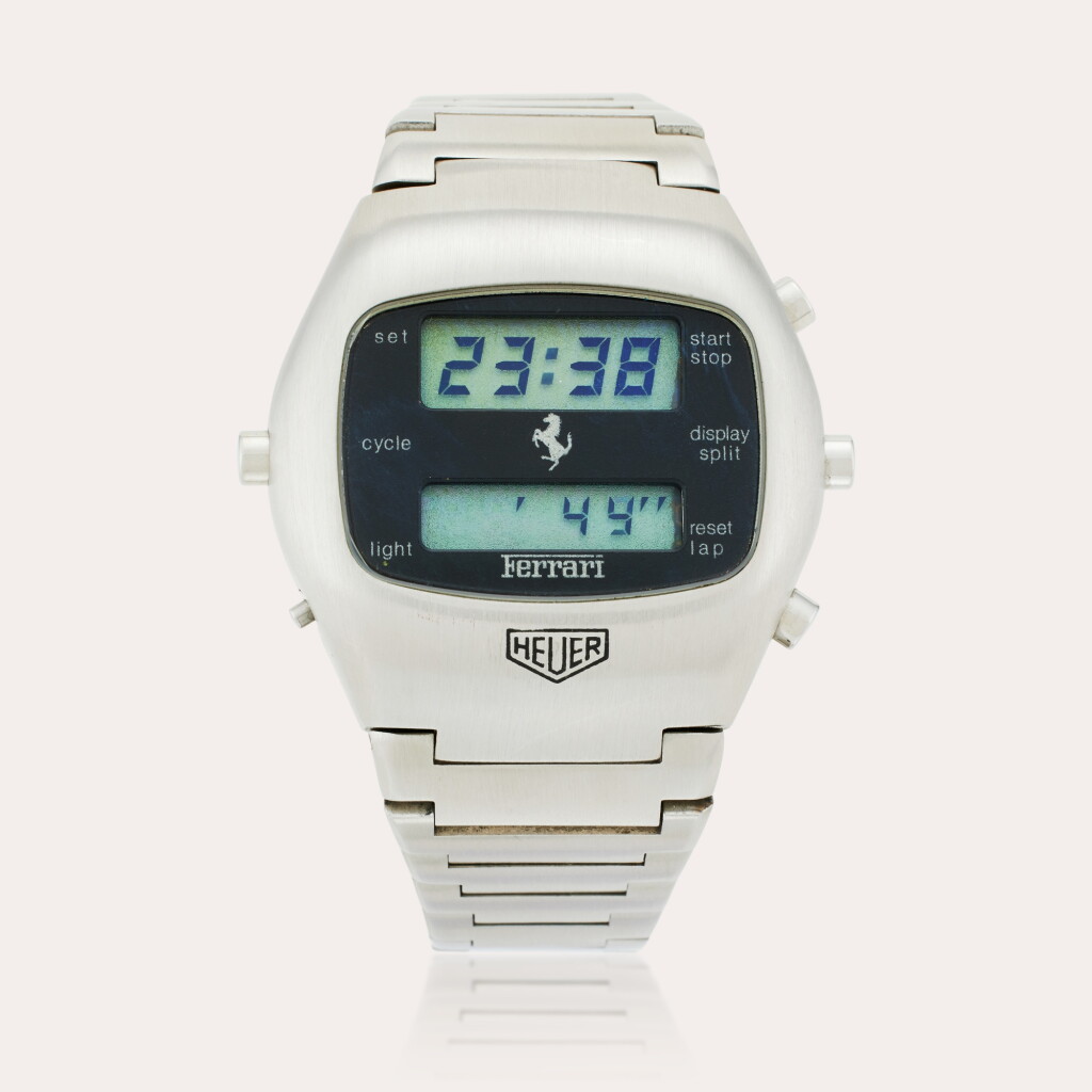 View full screen - View 1 of Lot 121. Reference 102.703 Chronosplit ‘Ferrari’ | A limited edition stainless steel chronograph wristwatch with date, Owned by Phil Hill, Circa 1977.