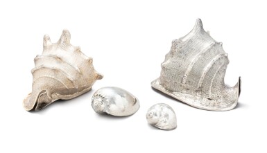 View full screen - View 1 of Lot 21. A group of four silver-covered seashells, Buccellati, Milan, circa 1980 | Ensemble de quatre coquillages recouverts d'argent par Buccellati, Milan, vers 1980 .