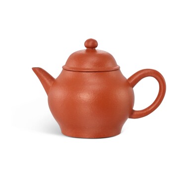 View full screen - View 1 of Lot 454. An inscribed Yixing red stoneware teapot, Qing dynasty, 19th century 清十九世紀 宜興朱泥茶壺 《錦堂福記》《國色》《袁義和》款.