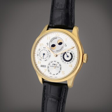 View full screen - View 1 of Lot 340. Reference IW5021 Portugieser | A yellow gold automatic perpetual calendar wristwatch with moon phases and 7 day power reserve indication, Circa 2005.