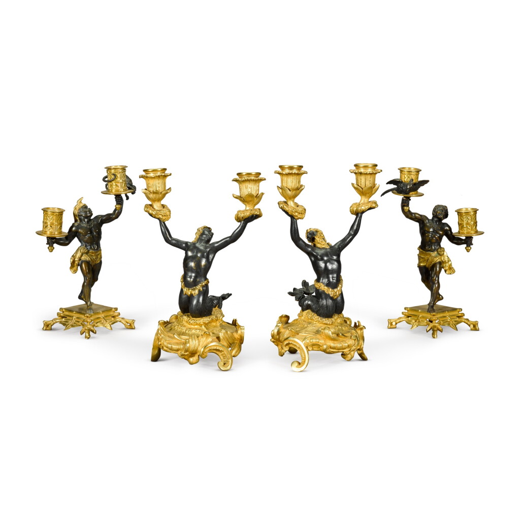 View full screen - View 1 of Lot 103. A group of four French gilt and patinated bronze two-light candelabra, 19th century.