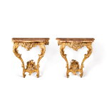 A pair of Louis XV giltwood consoles, circa 1750 | Paire de consoles en bois doré d'époque Louis XV, vers 1750