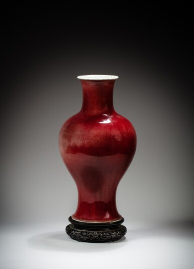 View full screen - View 1 of Lot 129. A large red-glazed baluster vase, Qing dynasty, Kangxi period | 清康熙 紅釉大瓶.