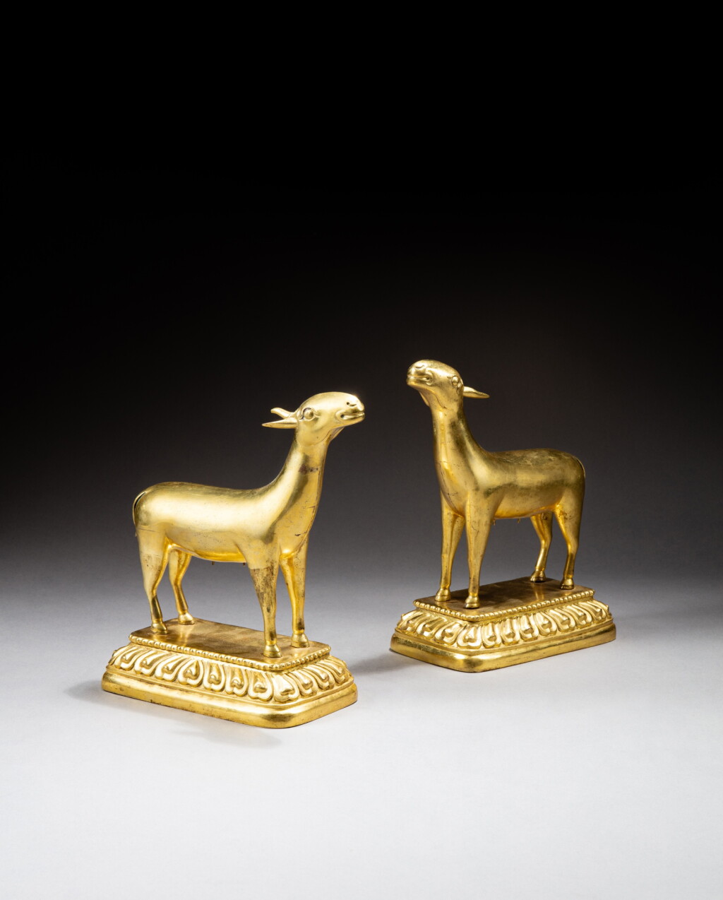 View full screen - View 1 of Lot 37. A pair of gilt-copper deer figures, Qing dynasty, 18th century | 清十八世紀 銅鎏金鹿像一對.