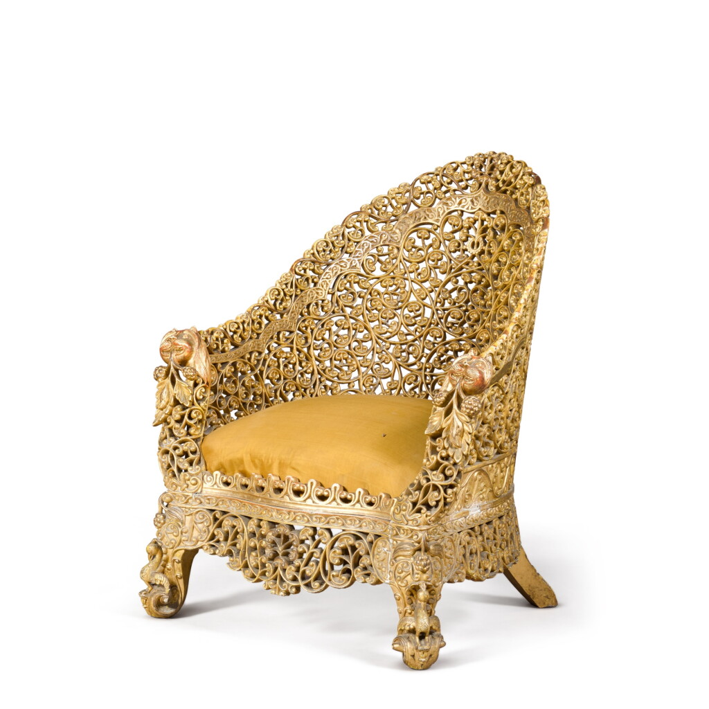 View full screen - View 1 of Lot 51. An Anglo-Indian giltwood bergère, Bombay, 19th century.