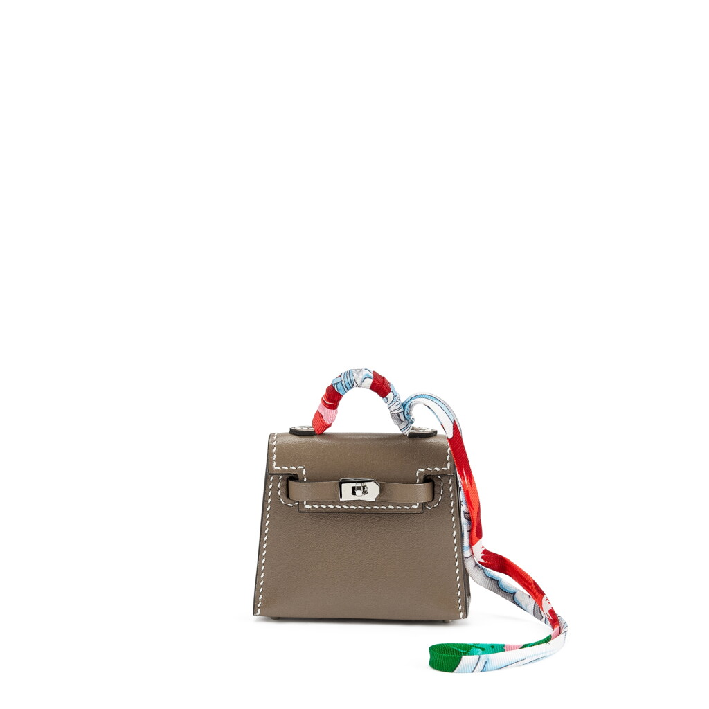 View full screen - View 1 of Lot 5658. Etoupe Tadelakt Micro Mini Kelly Twilly Bag Charm Palladium Hardware, 2020.