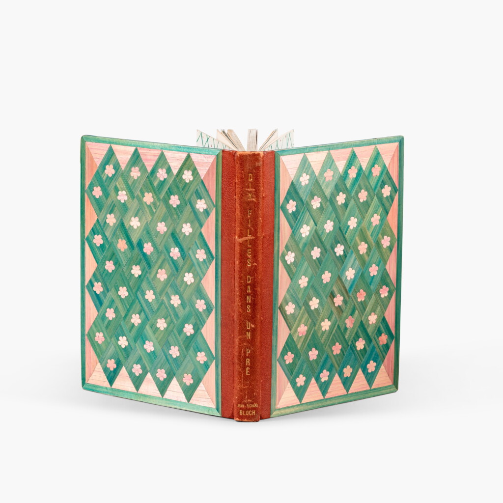 View full screen - View 1 of Lot 97. Dix filles dans un pré. Paris, 1926. Élégante reliure en damier de marqueterie de paille, attribuable à Lison de Caunes. Édition originale. 4 eaux-fortes de Marie Laurencin..