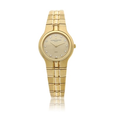 View full screen - View 1 of Lot 27. Phidias A yellow gold bracelet watch with diamond-set indexes, Circa 1990.