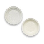 Two moulded 'Huozhou' white-glazed 'flowers' dishes, Northern Song dynasty | 北宋 霍州窰白釉印花卉紋折沿盤一組兩件