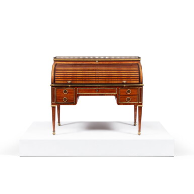 View full screen - View 1 of Lot 156. A Louis XVI gilt-bronze mounted tulipwood, amaranth, satiné and holly stringing veneered cylinder desk, circa 1780, stamped Mathieu-Guillaume Cramer.