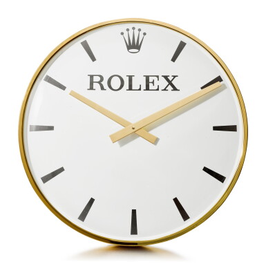 View full screen - View 1 of Lot 198. ROLEX | A GILT BRASS WALL CLOCK, CIRCA 1960.