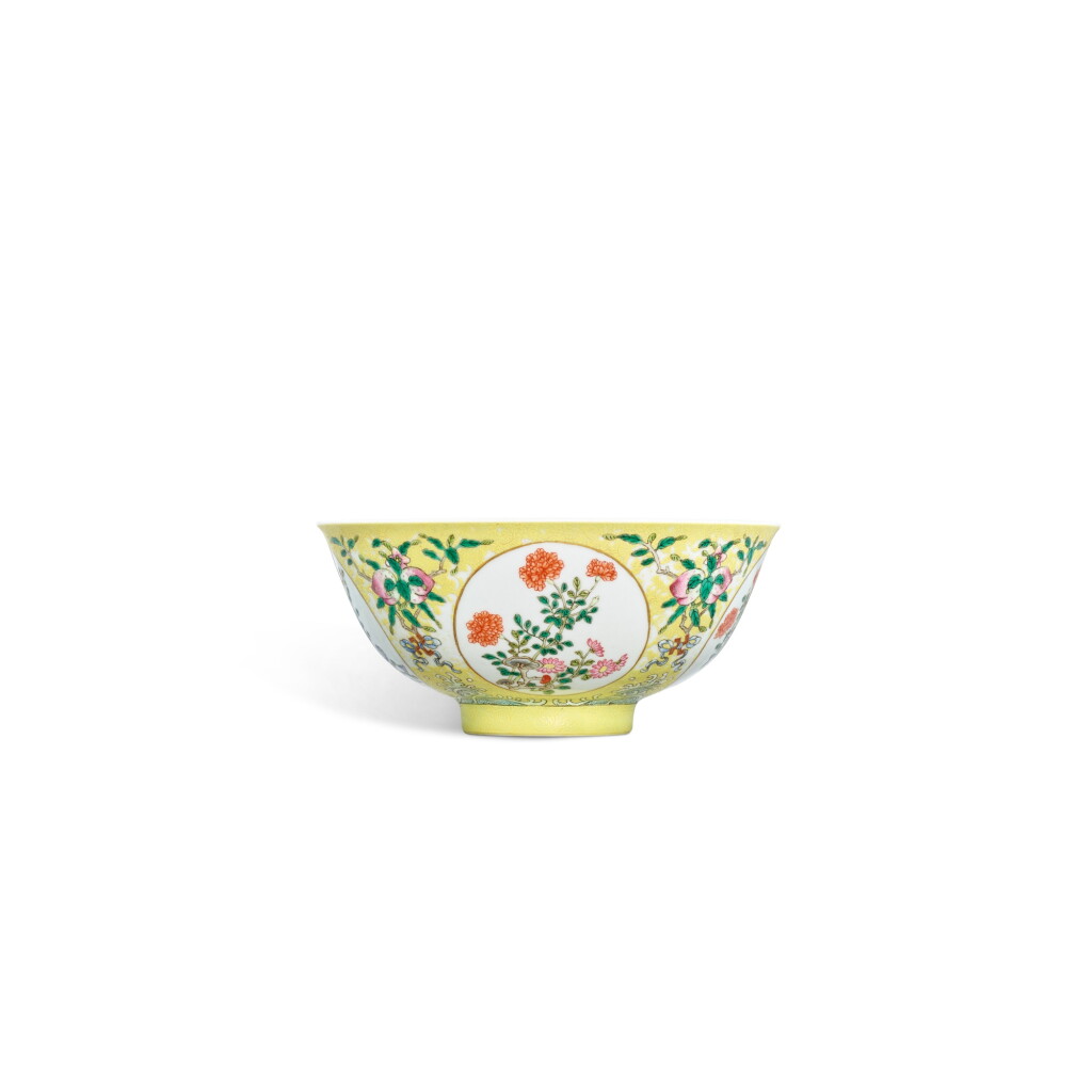 View full screen - View 1 of Lot 3357. A yellow-ground famille-rose 'flower' bowl, Seal mark and period of Qianlong | 清乾隆 黃地軋道開光粉彩花卉紋盌 《大清乾隆年製》款.