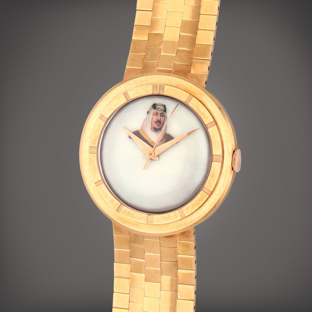 View full screen - View 1 of Lot 406. Reference 106525-3A | A yellow gold bracelet watch with enamel dial depicting His Highness King Saud Bin Abdul Aziz | Circa 1955.