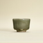 A Longquan celadon-glazed incense burner, Ming dynasty | 明 龍泉青釉三足筒式爐