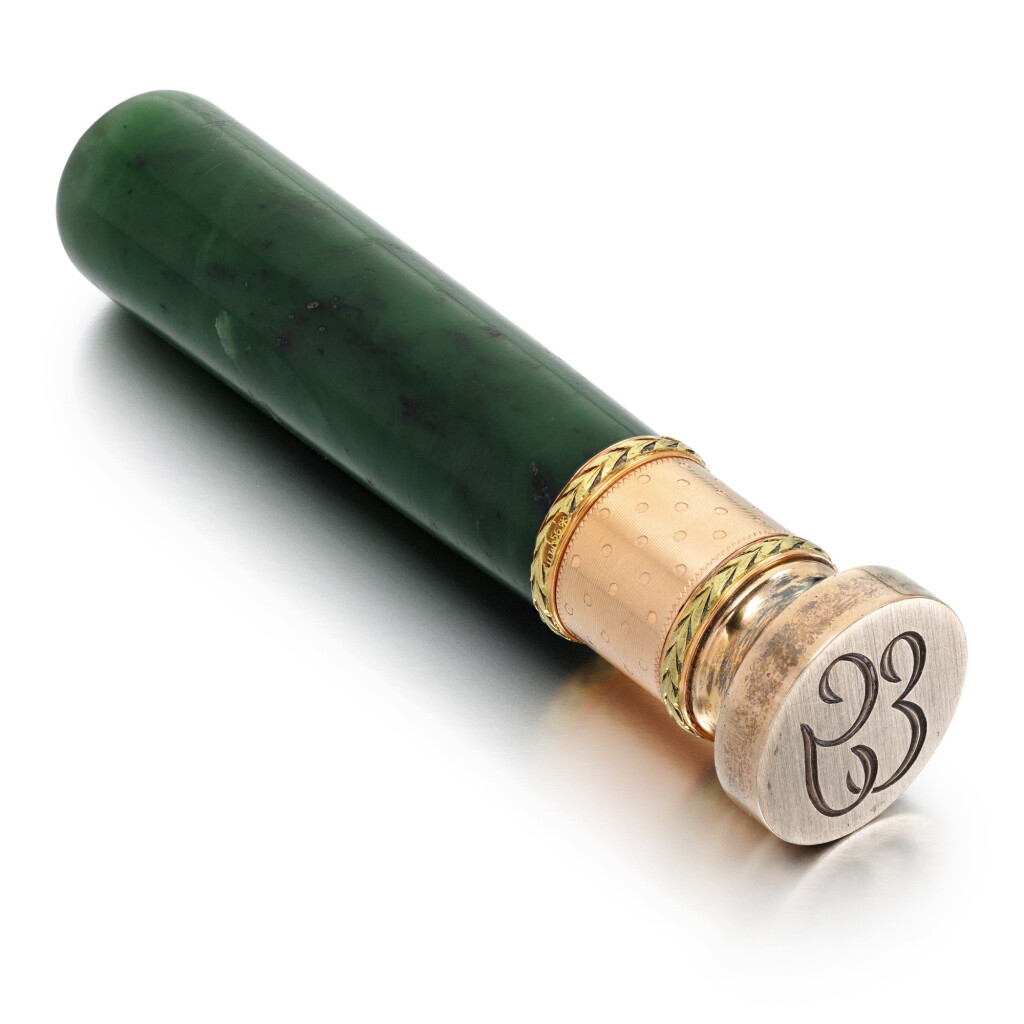 View full screen - View 1 of Lot 70. A FABERGÉ THREE-COLOUR GOLD AND NEPHRITE PARASOL HANDLE, WORKMASTER MICHAEL PERCHIN, ST PETERSBURG, CIRCA 1890.
