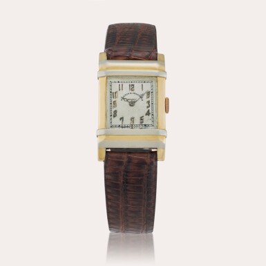 View full screen - View 1 of Lot 545. A yellow and white gold rectangular wristwatch, Circa 1920.