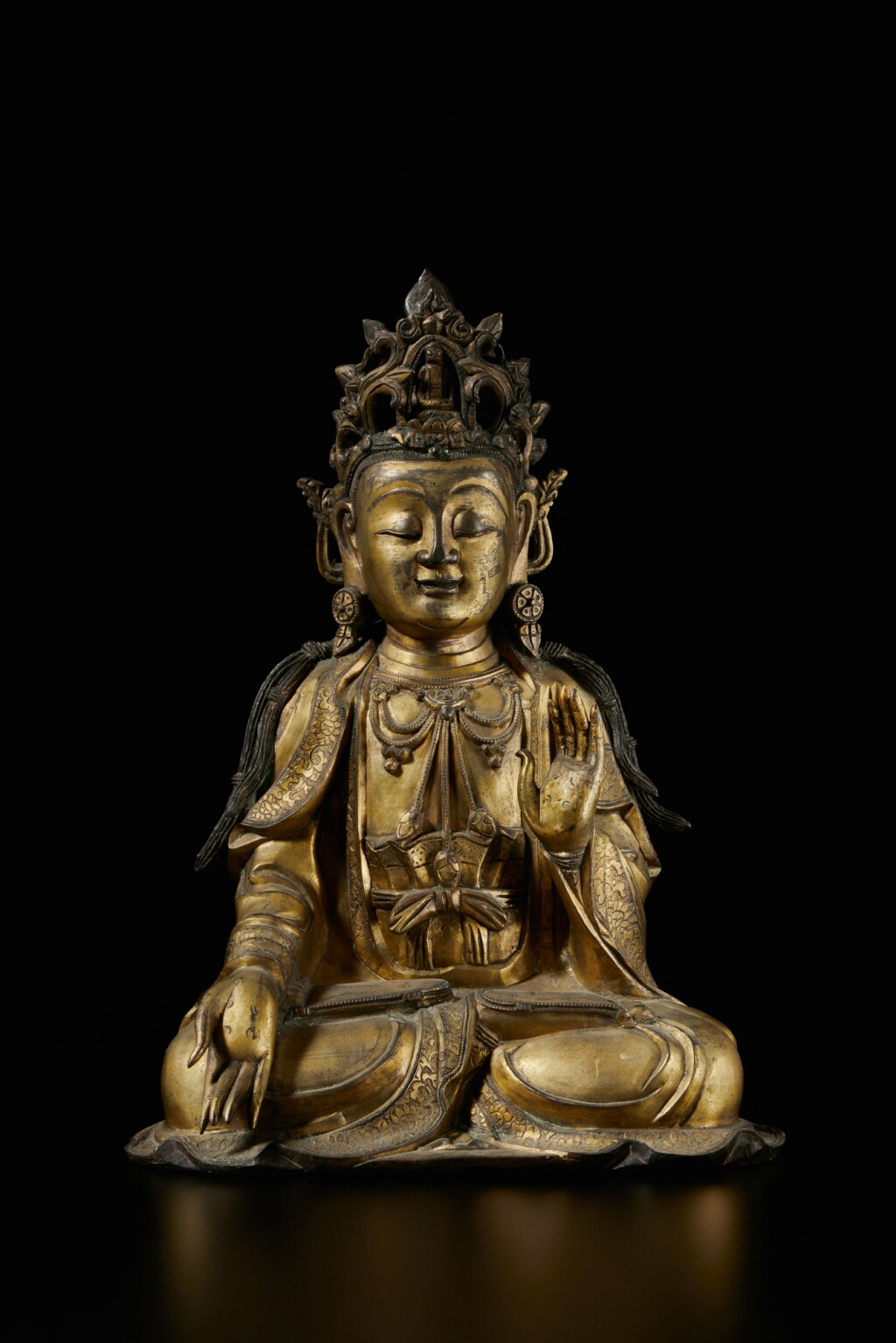 View full screen - View 1 of Lot 306. A large gilt-bronze seated figure of Avalokiteshvara, Late Ming dynasty.