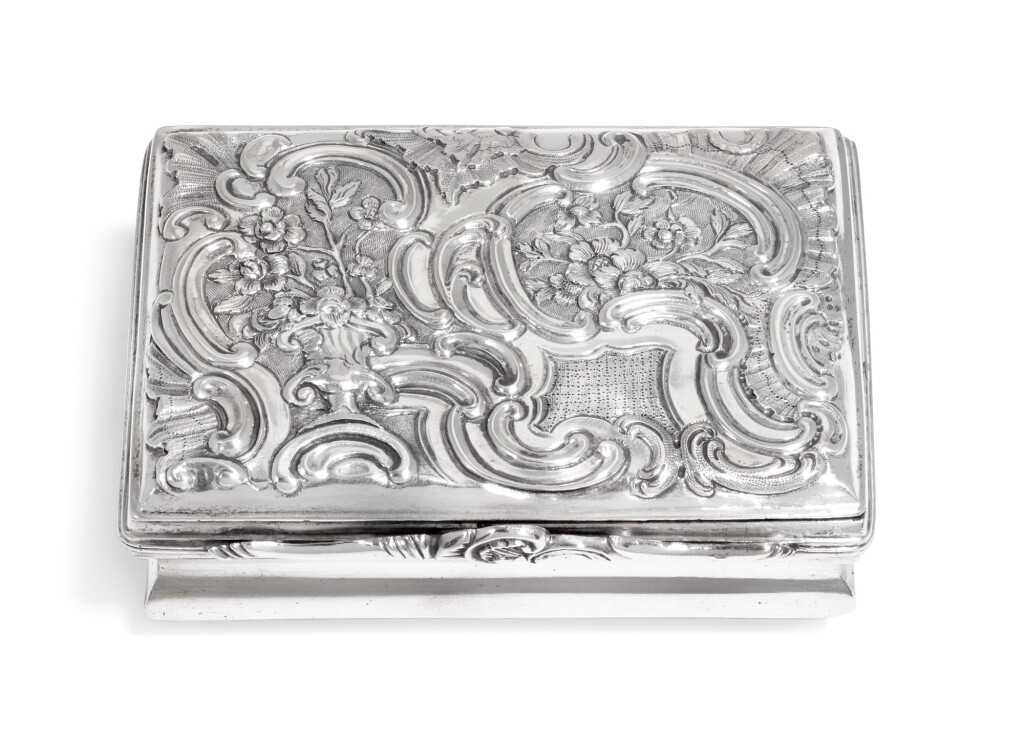 View full screen - View 1 of Lot 37. A German silver, ivory and painted leather snuff box with hidden compartment, probably German, circa 1740.
