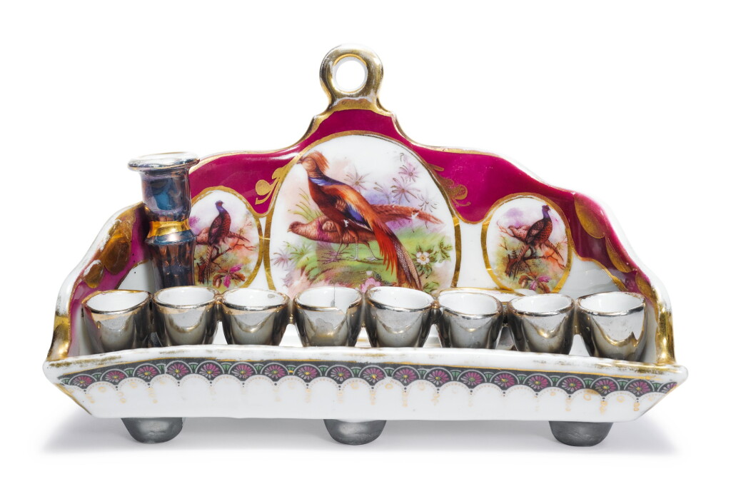 View full screen - View 1 of Lot 138. A RARE EASTERN EUROPEAN PORCELAIN HANUKAH LAMP, EARLY 20TH CENTURY.