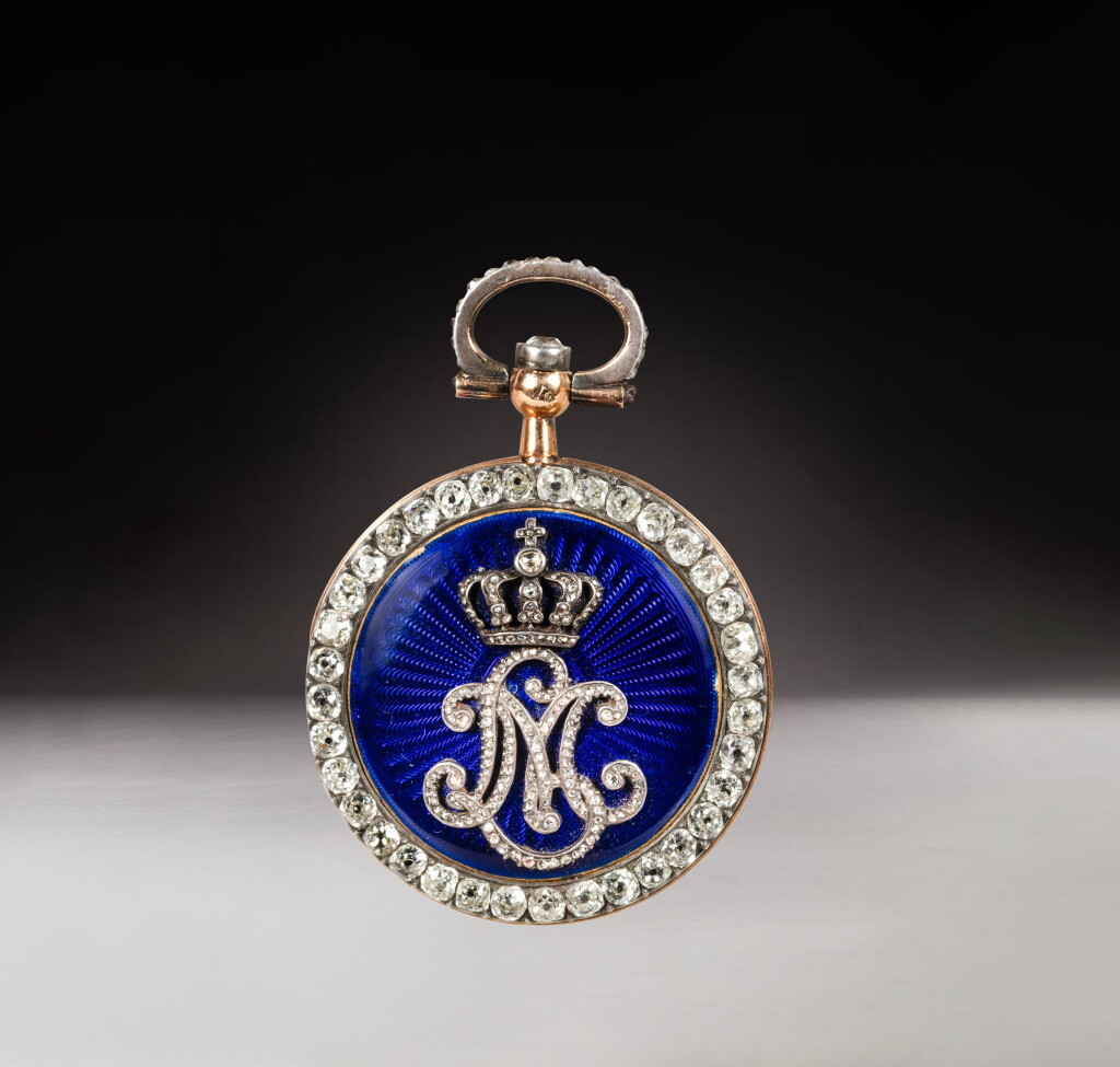 View full screen - View 1 of Lot 82. A French Empire gold, enamel, and diamond necklace watch, circa 1812-1814, attributed to Nitot, with the monogram of Empress Marie-Louise.