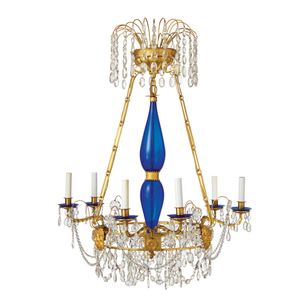 View full screen - View 1 of Lot 827. A SWEDISH NEOCLASSICAL CUT-GLASS, GILT BRONZE, CLEAR AND BLUE GLASS SIX-LIGHT CHANDELIER, CIRCA 1810.