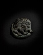 A very rare archaic bronze 'boar' bridle fitting, Western Zhou dynasty