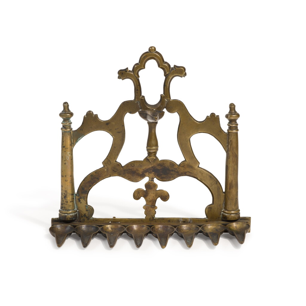 View full screen - View 1 of Lot 137. A Cast Brass Hanukkah Lamp, probably Italian, late 17th-early 18th century.