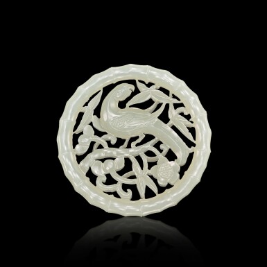 View full screen - View 1 of Lot 3021. A reticulated white jade 'magpie and prunus' plaque, Qing dynasty, 18th - 19th century 清十八至十九世紀 白玉鏤雕喜上眉梢珮.