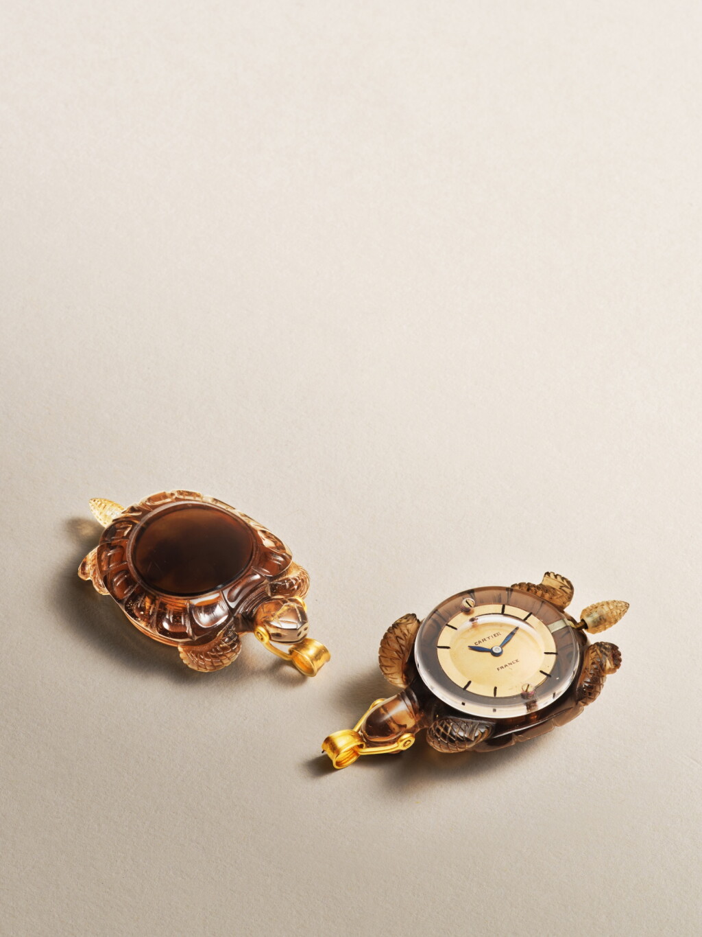 View full screen - View 1 of Lot 2262. A charming and highly unusual smoky quartz pendant watch in the form of a tortoise, Circa 1937 .