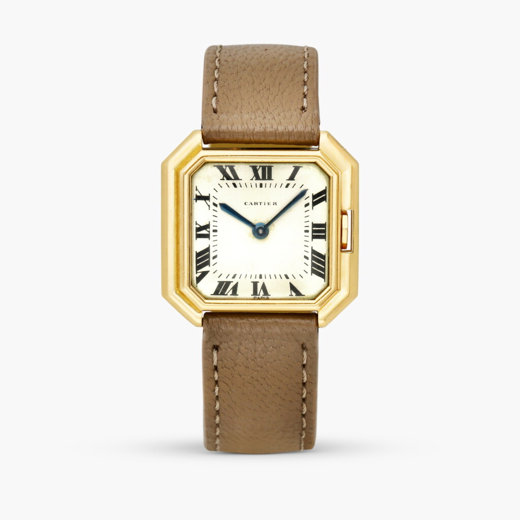 View full screen - View 1 of Lot 2494. Ceinture | An octagonal yellow gold wristwatch with stepped bezel and gold deployant buckle, Circa 1968.